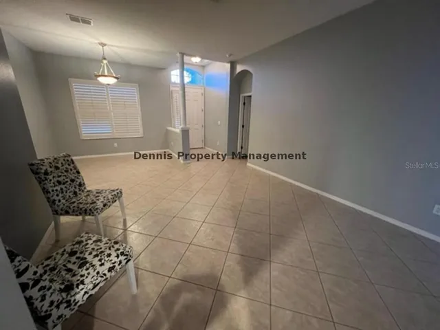 a bathroom with a bathtub a sink and a mirror