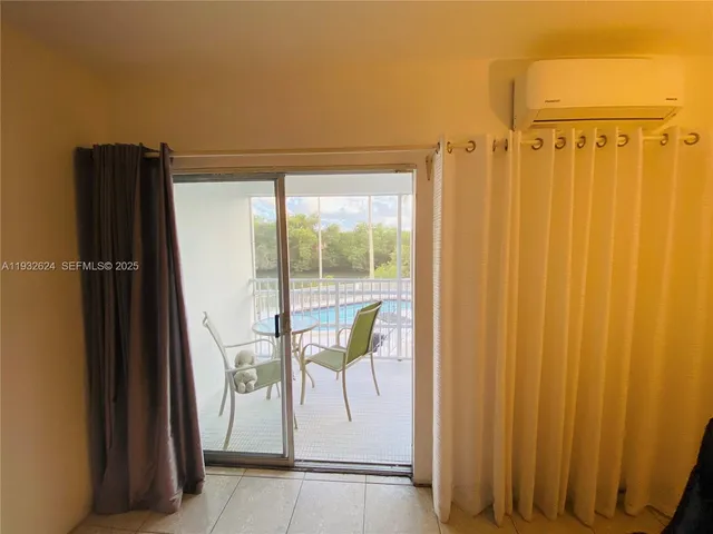 a view of a balcony with a swing