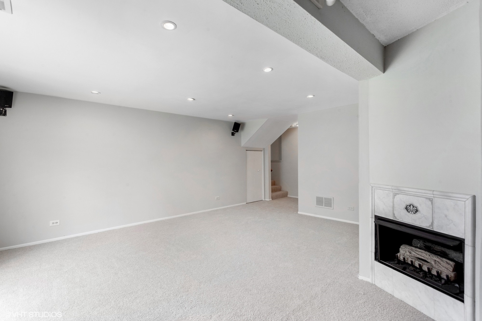 49 Deerpath Road Matteson, IL 60443 - Photo 14 of 16 a view of an empty room with a fireplace and a window