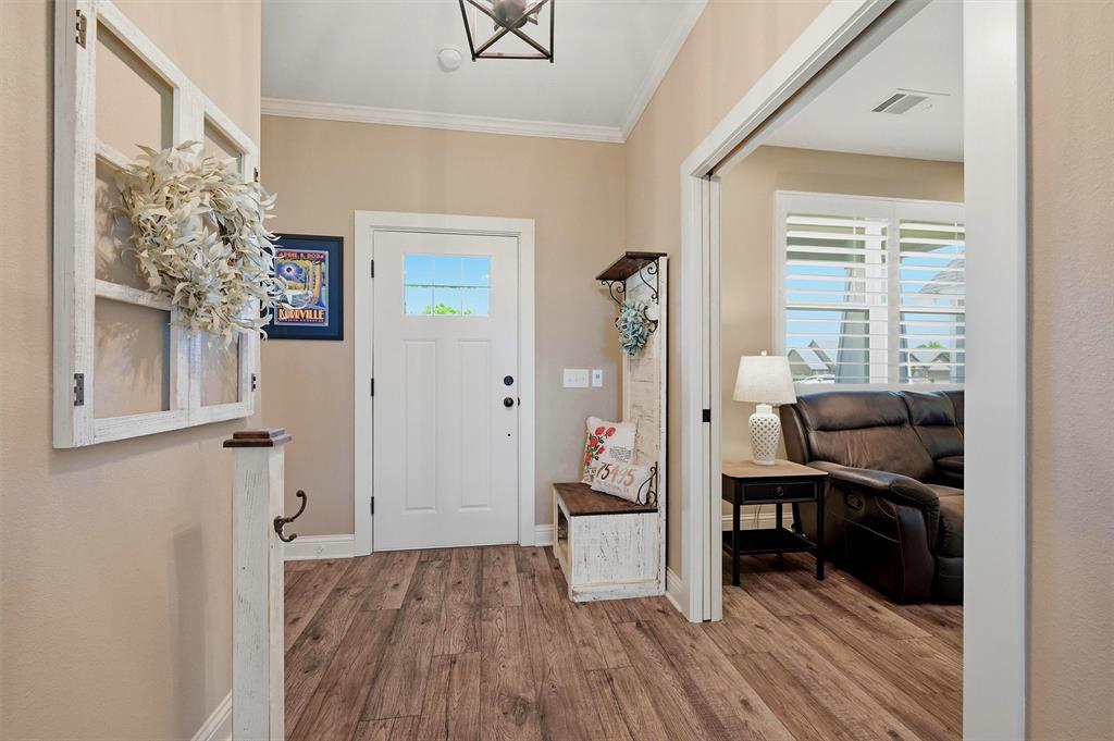 662 Preakness Place Road Van Alstyne, TX 75495 - Photo 5 of 39 a view of a workspace with furniture and a window