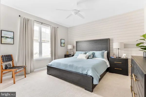 a bed room with a bed and a couch