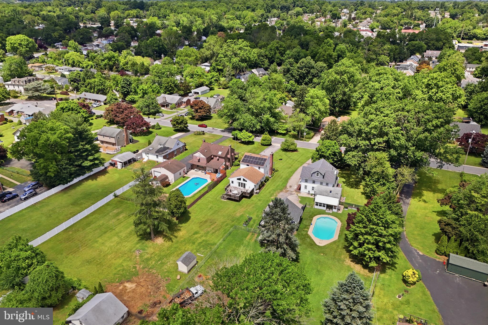 1004 Green Lane Secane, PA 19018 - Photo 43 of 49 an aerial view of residential house with outdoor space and swimming pool
