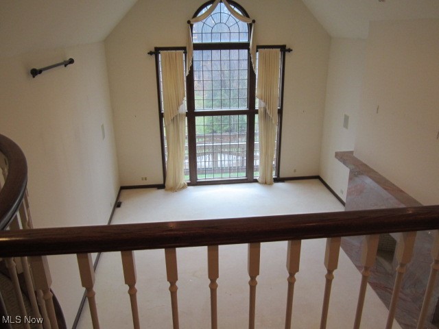 6999 Gates Road Gates Mills, OH 44040 - Photo 13 of 20 Stairs featuring carpet flooring and a towering ceiling