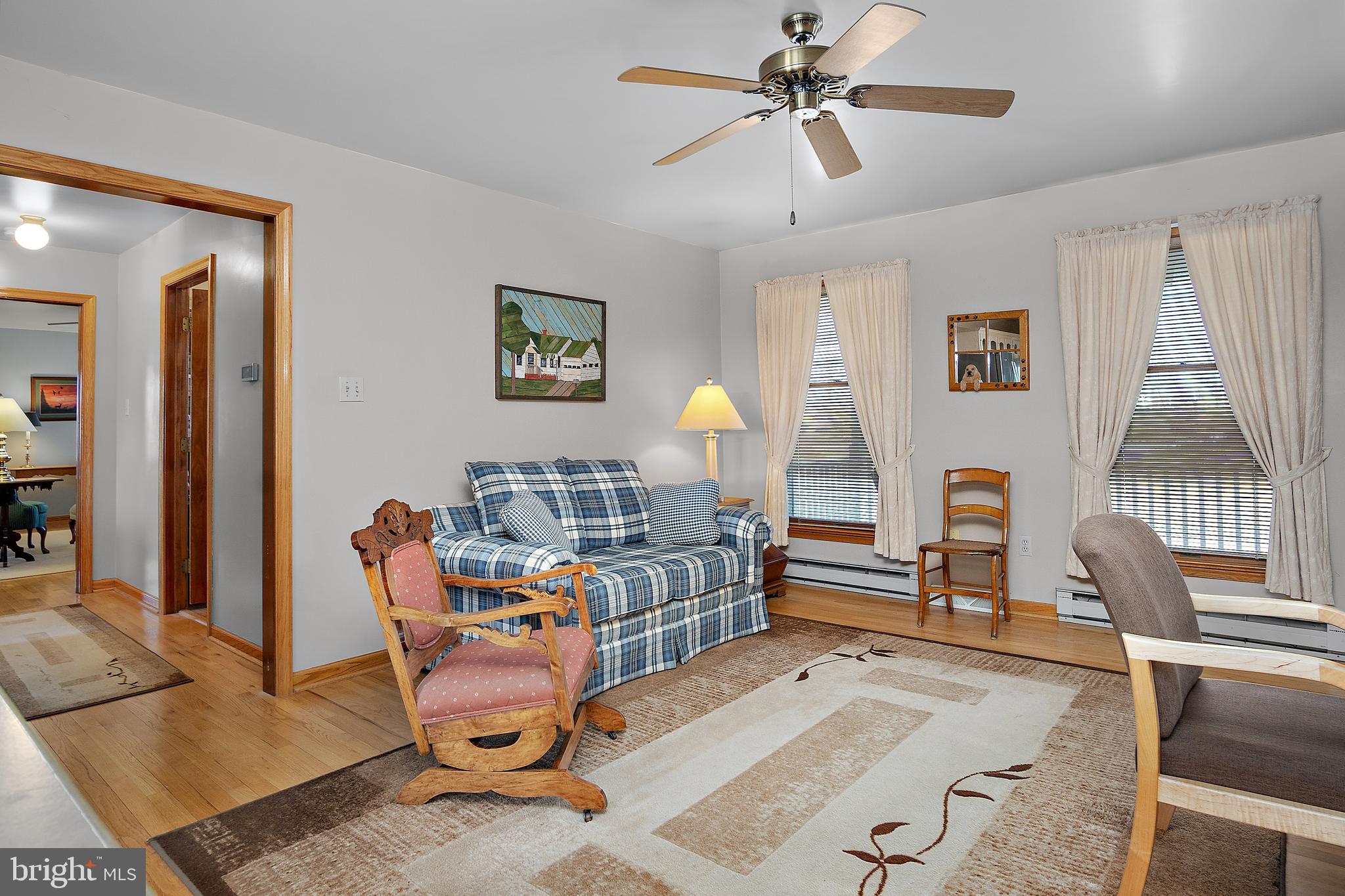 13810 Franks Run Road Smithsburg, MD 21783 - Photo 19 of 72 a living room with furniture and a window