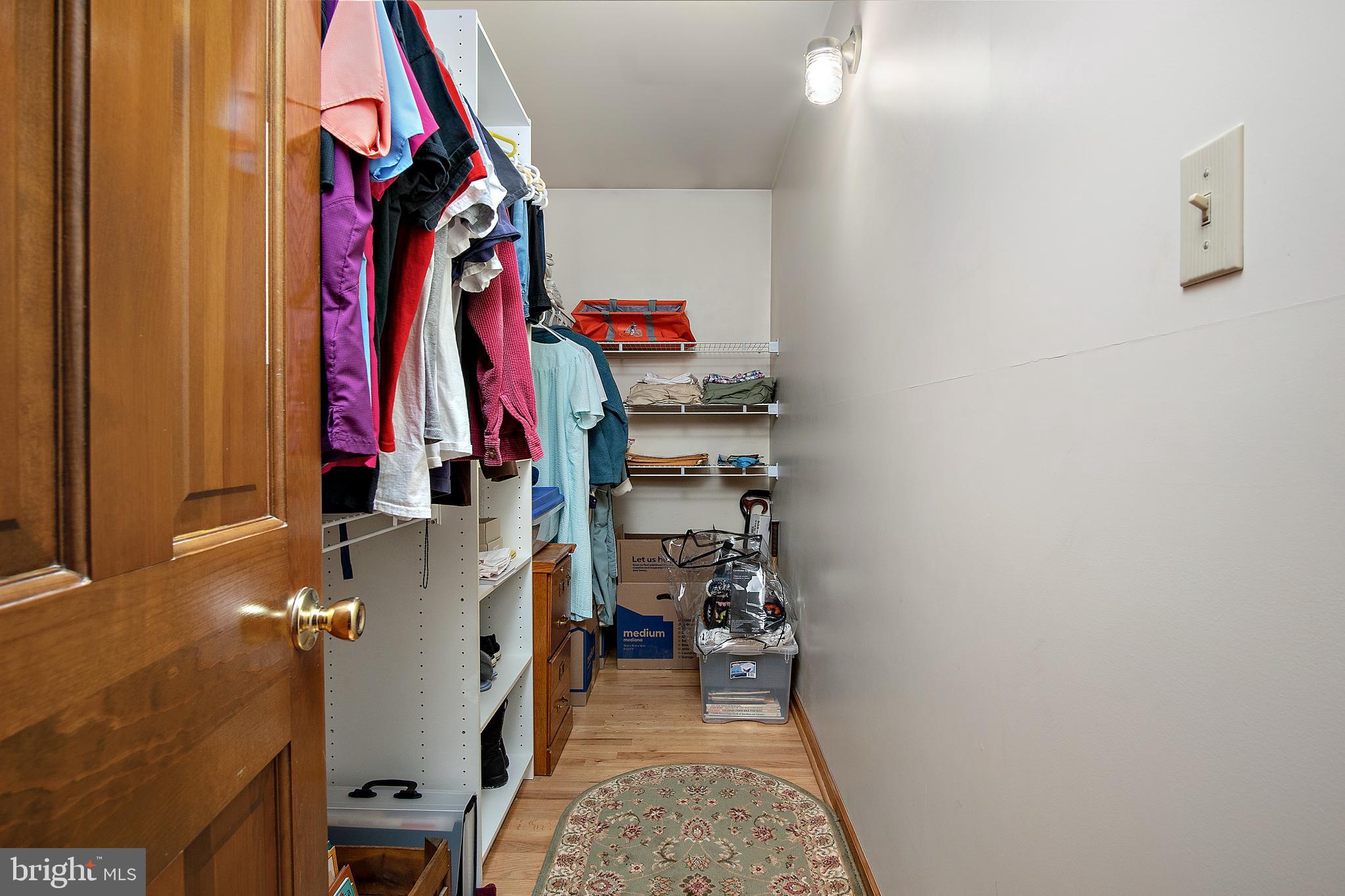 13810 Franks Run Road Smithsburg, MD 21783 - Photo 27 of 72 a view of walk in closet with clothes