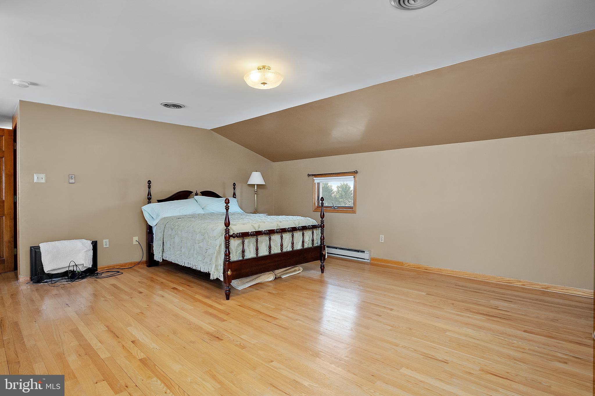 13810 Franks Run Road Smithsburg, MD 21783 - Photo 33 of 72 a bedroom with a bed and a mirror