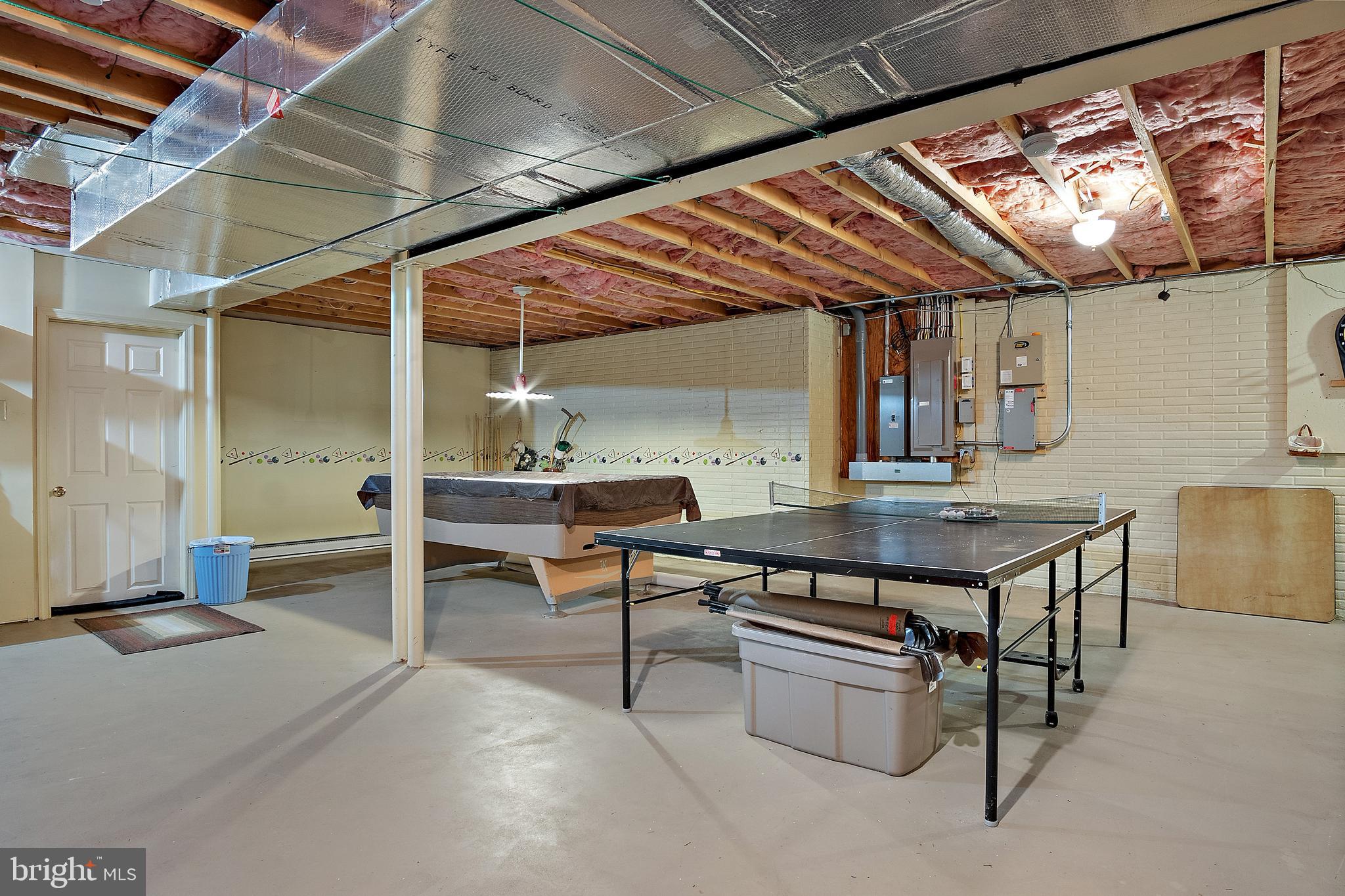 13810 Franks Run Road Smithsburg, MD 21783 - Photo 49 of 72 a dining room with wooden floor and furniture