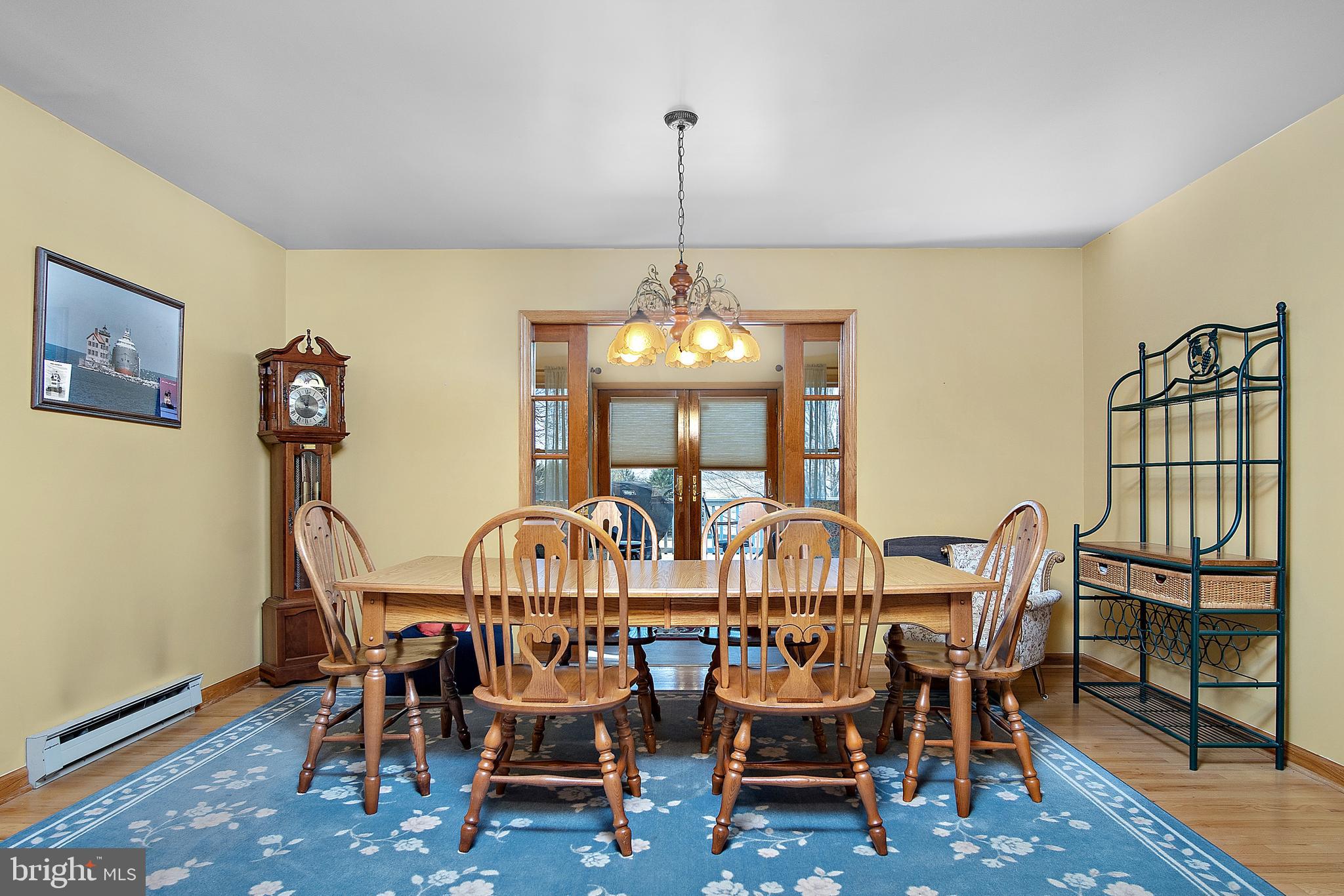 13810 Franks Run Road Smithsburg, MD 21783 - Photo 8 of 72 a view of a dining room with furniture and wooden floor
