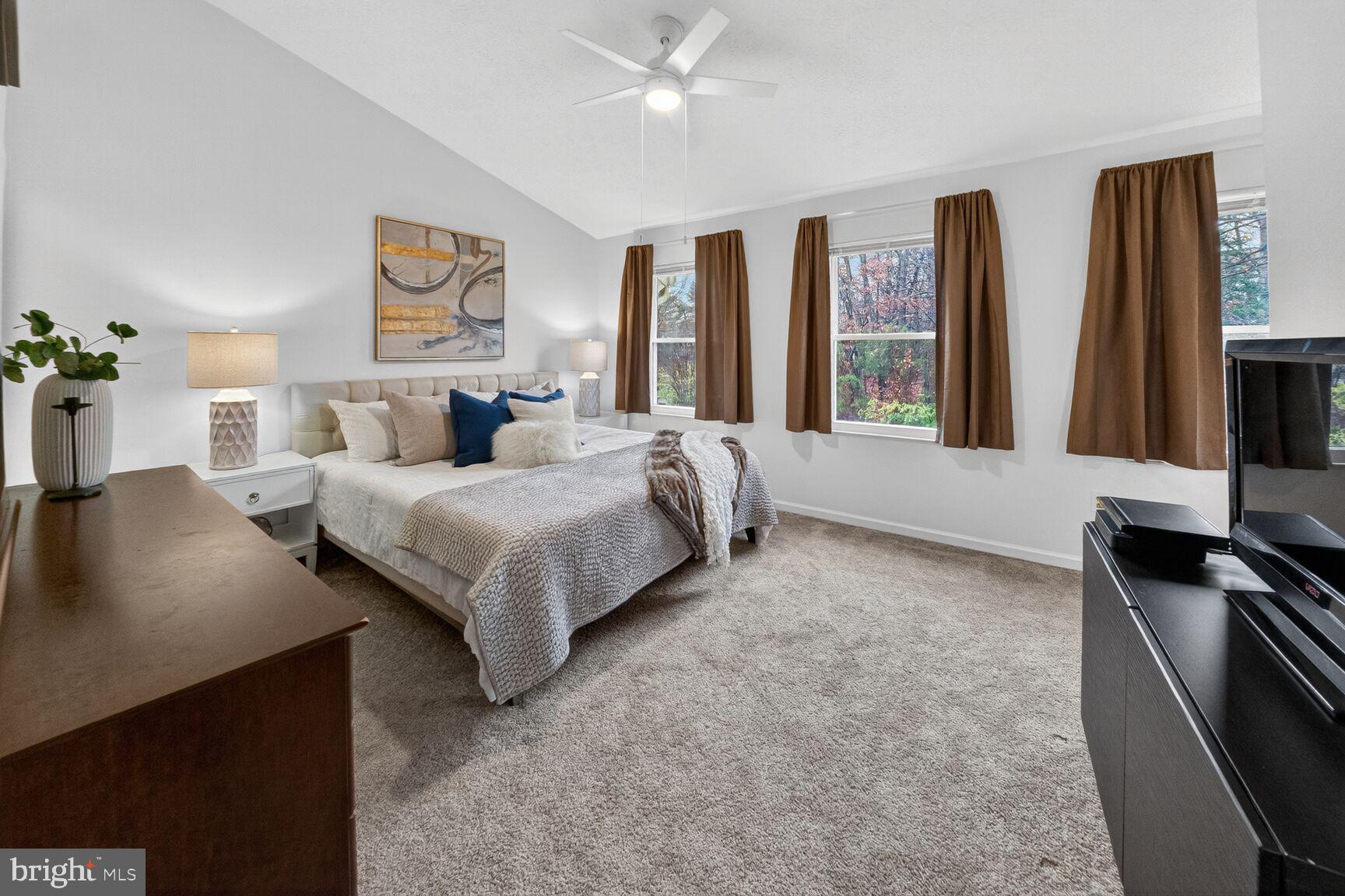 4303 Thistlewood Terrace Burtonsville, MD 20866 - Photo 11 of 26 a large bedroom with bed and window