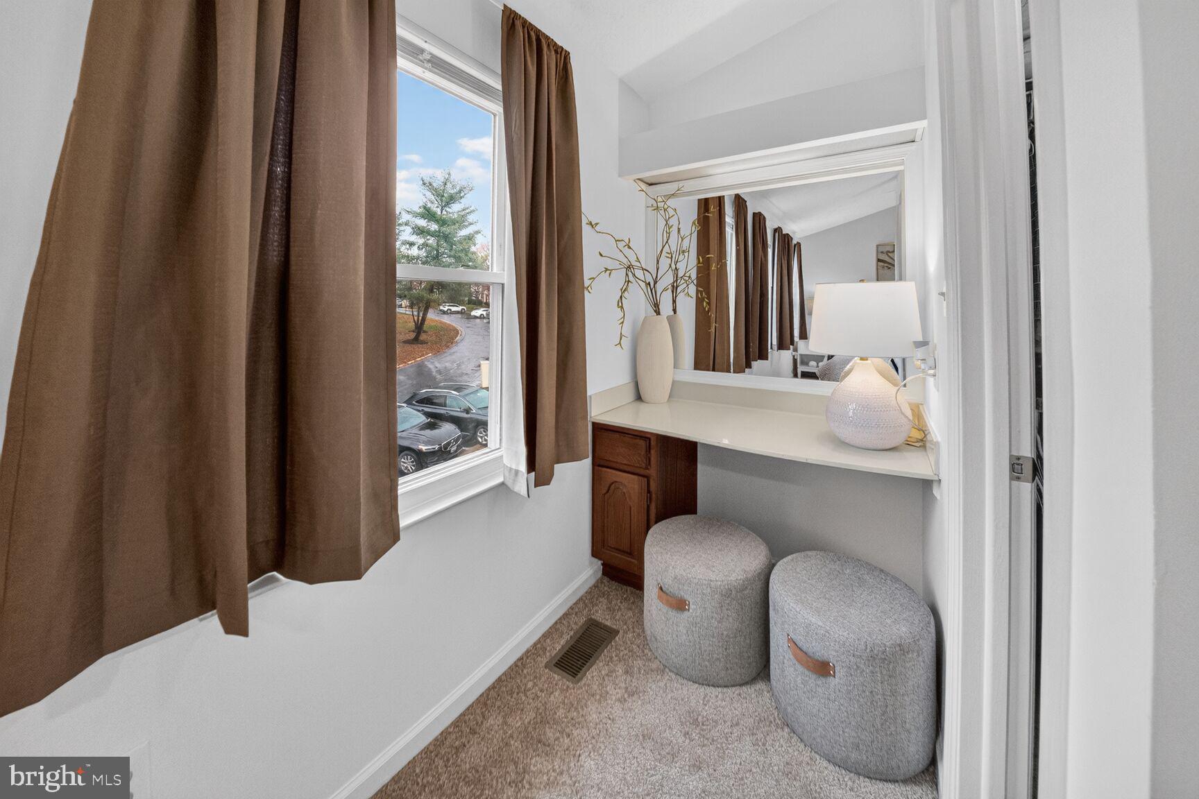 4303 Thistlewood Terrace Burtonsville, MD 20866 - Photo 13 of 26 a bathroom with a granite countertop sink and a mirror