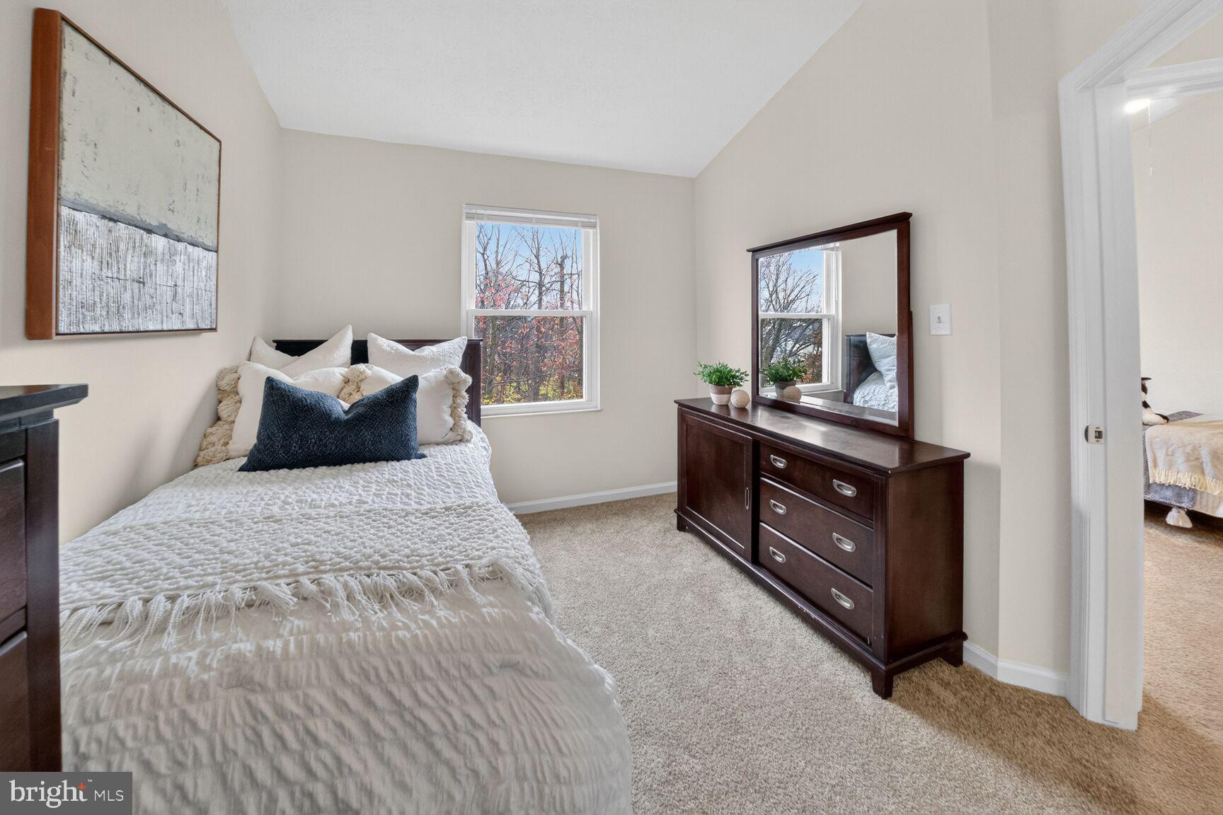 4303 Thistlewood Terrace Burtonsville, MD 20866 - Photo 19 of 26 a bedroom with a bed and window