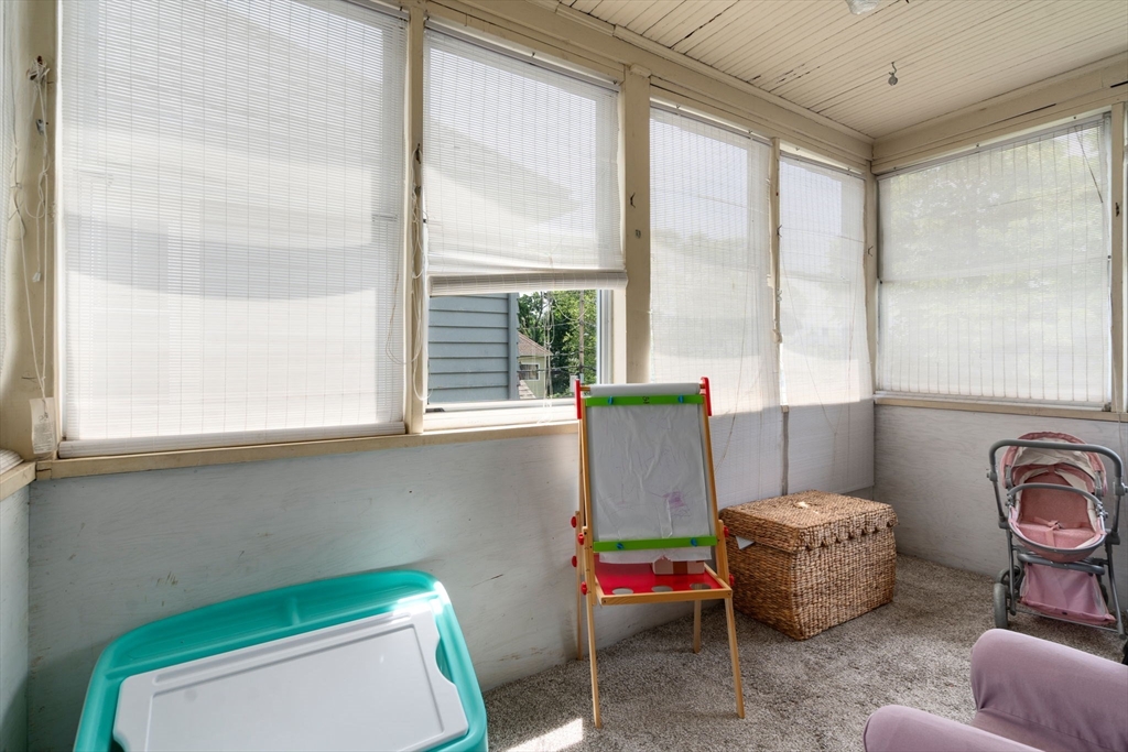 7 Winslow Road Belmont, MA 02478 - Photo 13 of 27 a living room with furniture and a window