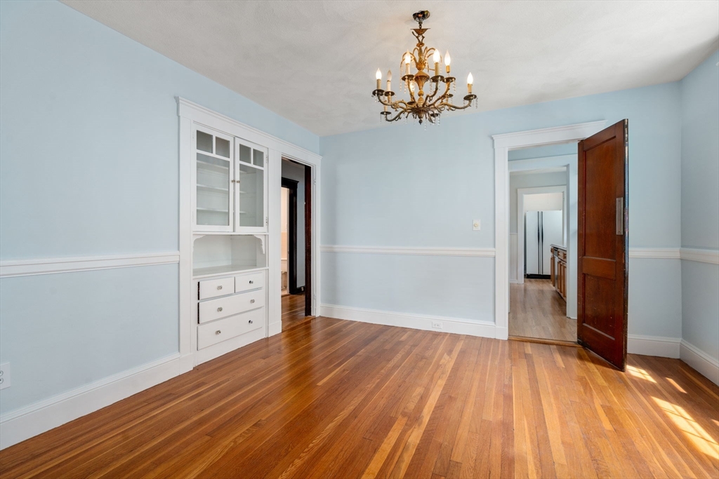 7 Winslow Road Belmont, MA 02478 - Photo 17 of 27 wooden floor in an empty room with a window