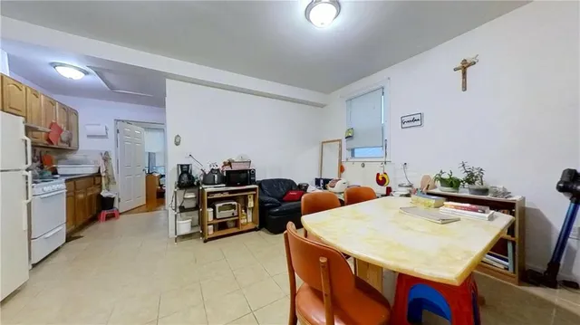 a view of kitchen with cabinets and wooden floor