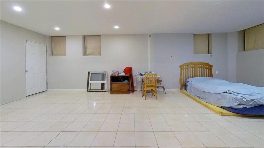 67 Stryker Street Brooklyn, NY 11223 - Photo 14 of 20 a living room with furniture