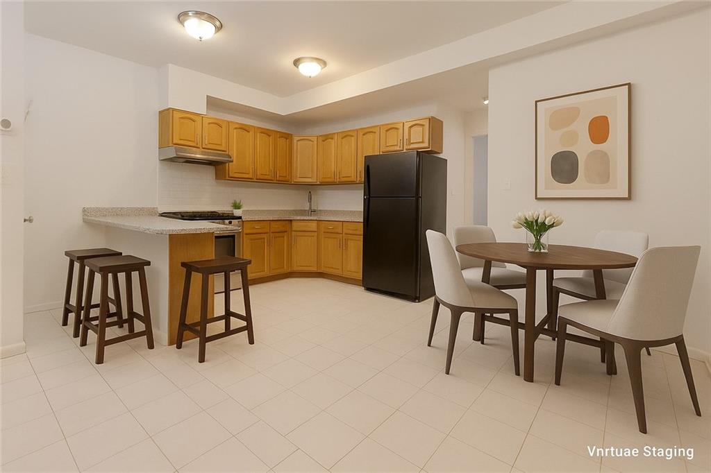 67 Stryker Street Brooklyn, NY 11223 - Photo 7 of 20 a view of a dining room with furniture