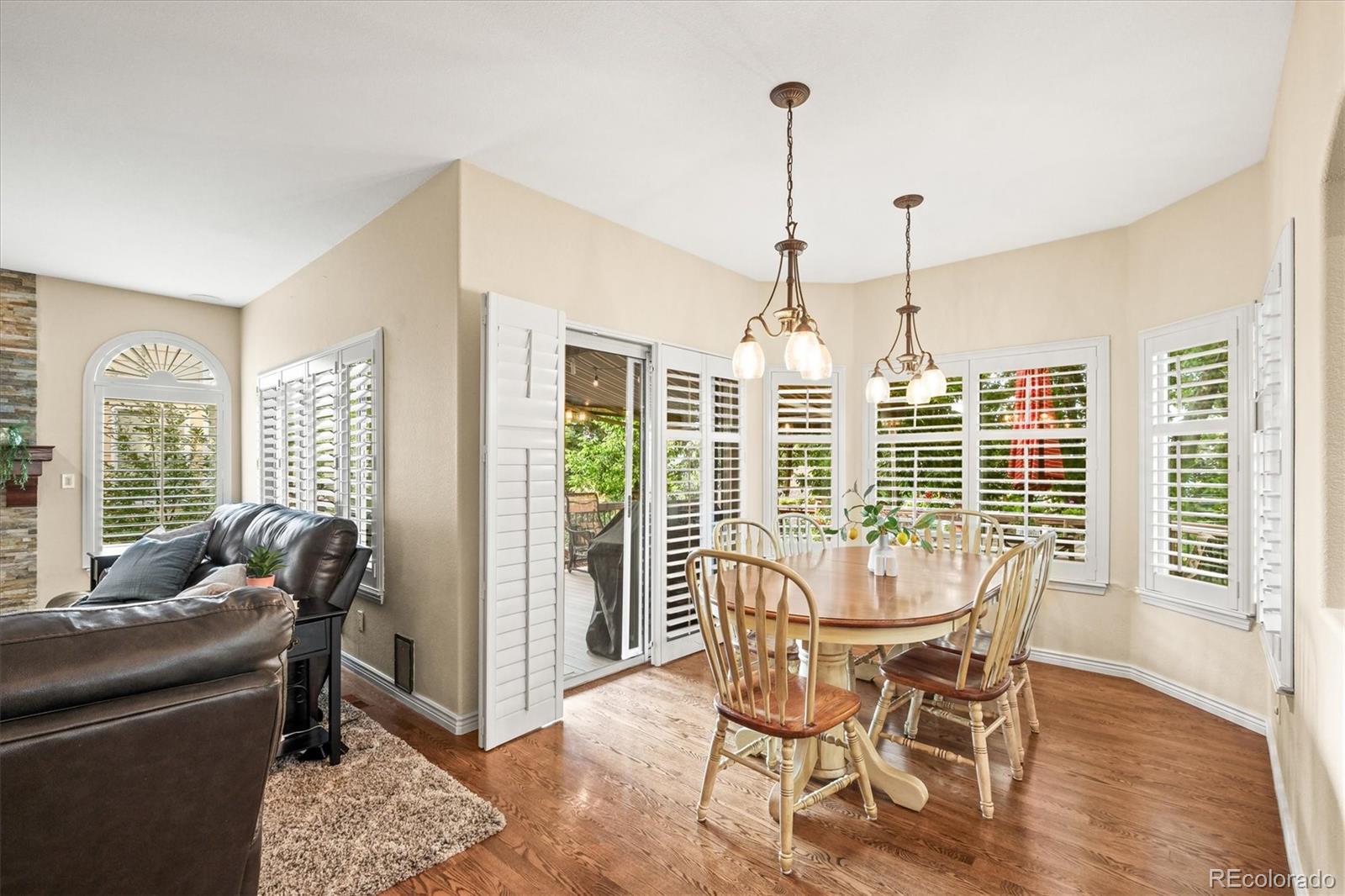 3115 White Oak Lane Highlands Ranch, CO 80129 - Photo 11 of 43 a view of a dining room with furniture window and outside view