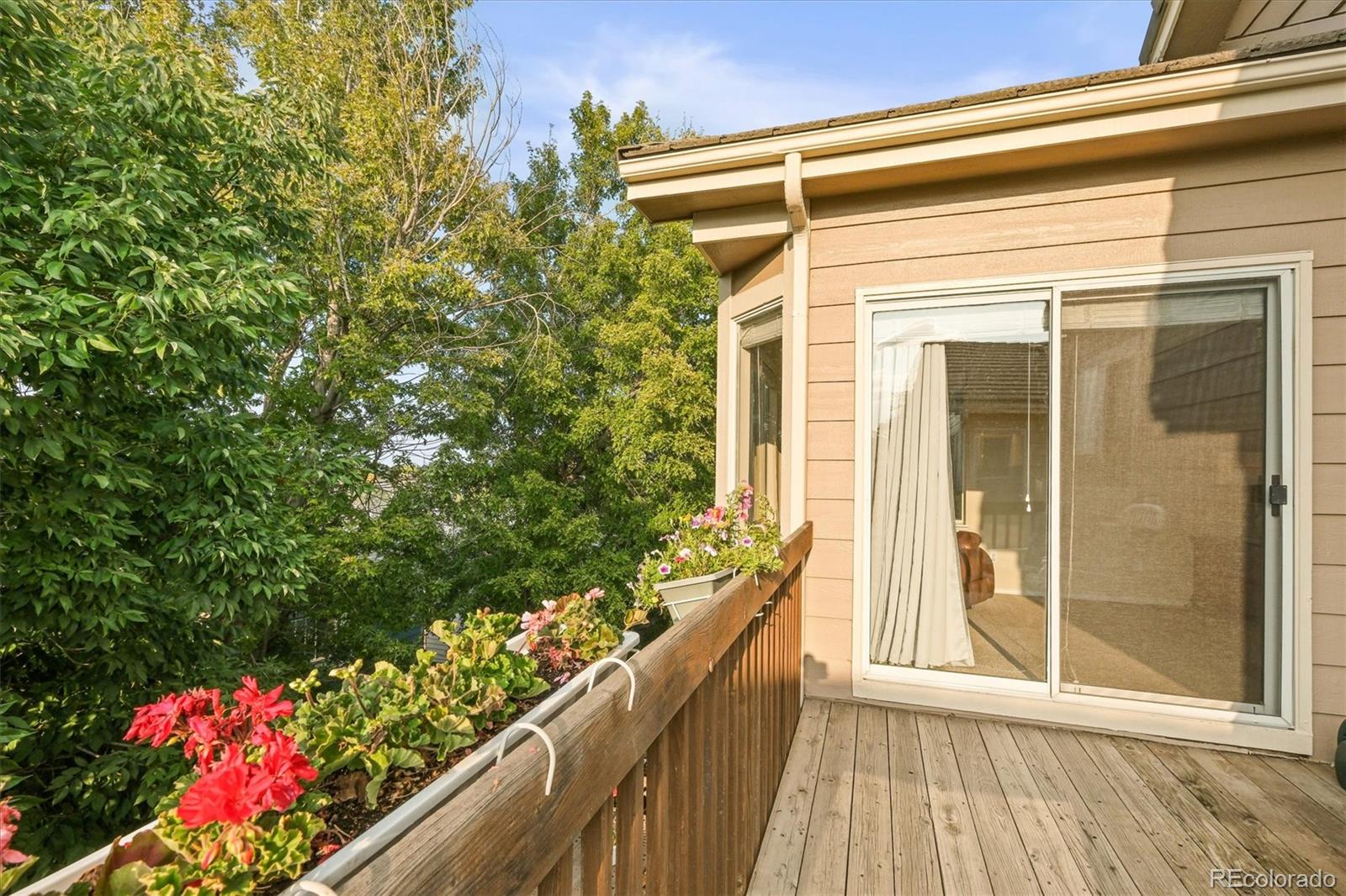 3115 White Oak Lane Highlands Ranch, CO 80129 - Photo 19 of 43 a view of a balcony with flowers
