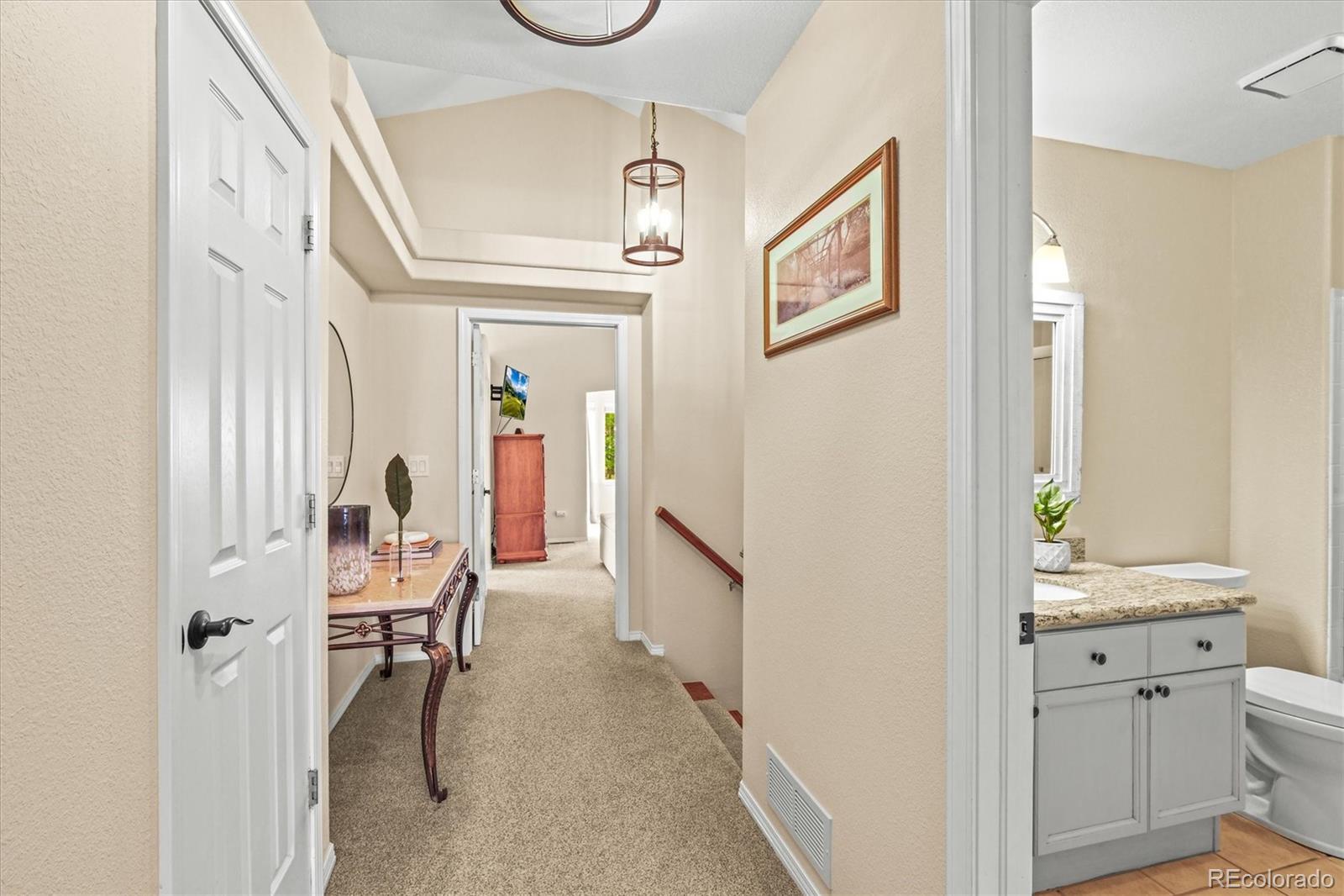 3115 White Oak Lane Highlands Ranch, CO 80129 - Photo 25 of 43 a view of a hallway with workspace and a hallway