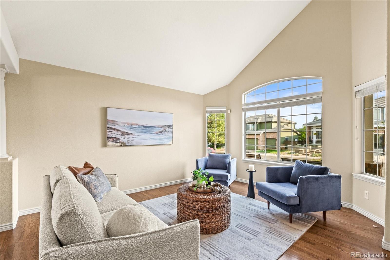 3115 White Oak Lane Highlands Ranch, CO 80129 - Photo 3 of 43 a living room with furniture and a large window