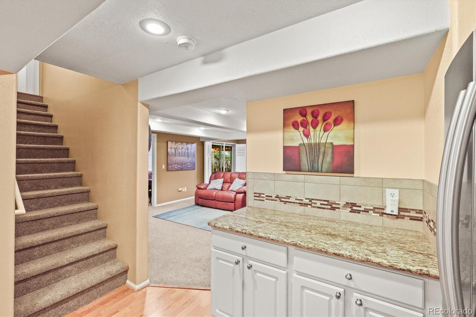 3115 White Oak Lane Highlands Ranch, CO 80129 - Photo 34 of 43 a bathroom with a granite countertop sink and a mirror