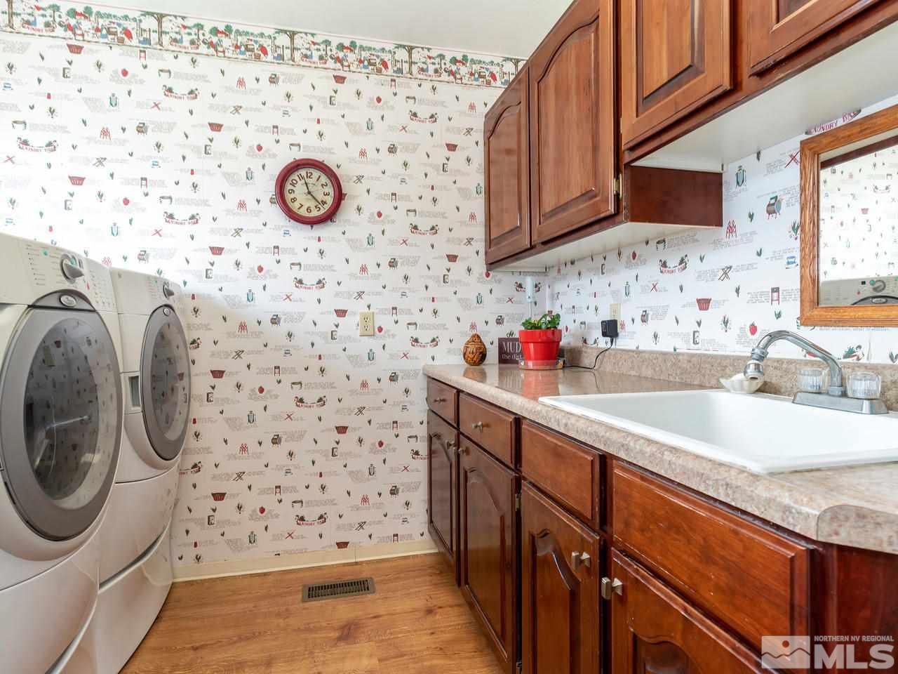 5112 Rivers Edge Drive Fallon, NV 89406 - Photo 17 of 25 a bathroom with a sink a toilet and a shower