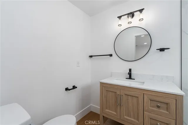 a bathroom with a toilet and a sink