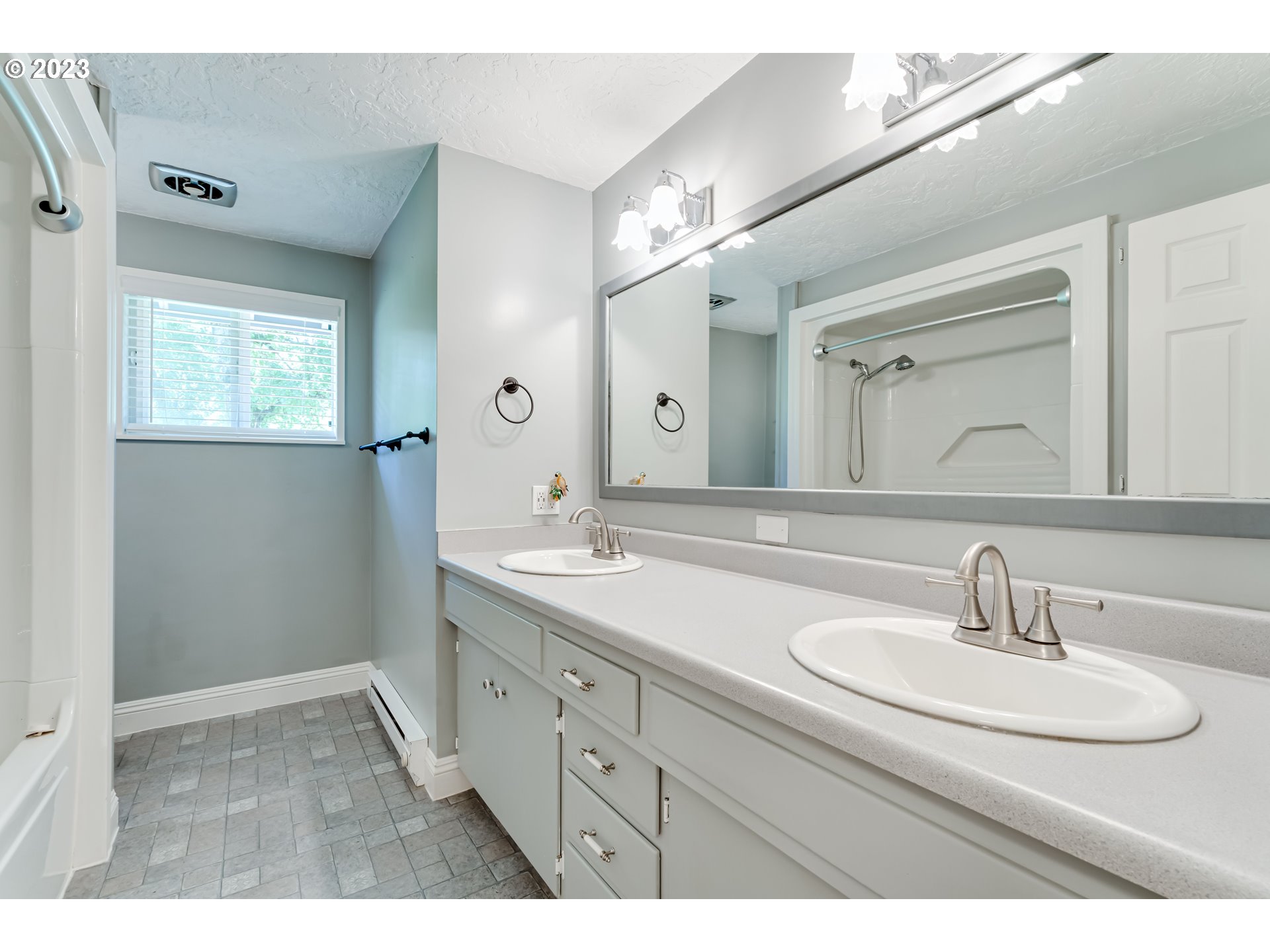 34886 Mathews Road Eugene, OR 97405 - Photo 21 of 48 a bathroom with a sink and a mirror