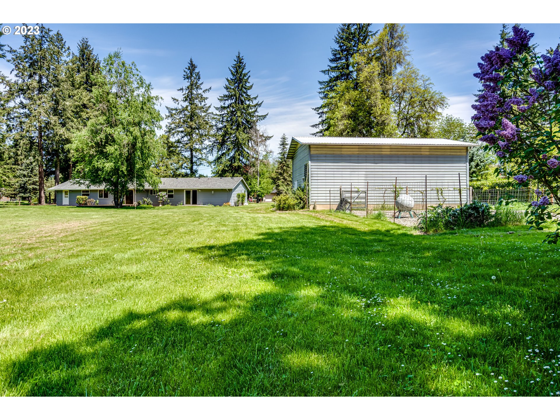 34886 Mathews Road Eugene, OR 97405 - Photo 33 of 48 a view of a house with a backyard