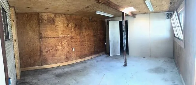 a view of hallway with shower