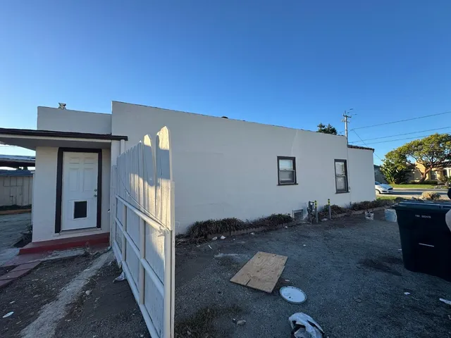 a view of backyard porch with seating space