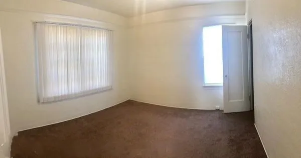 an empty room with windows