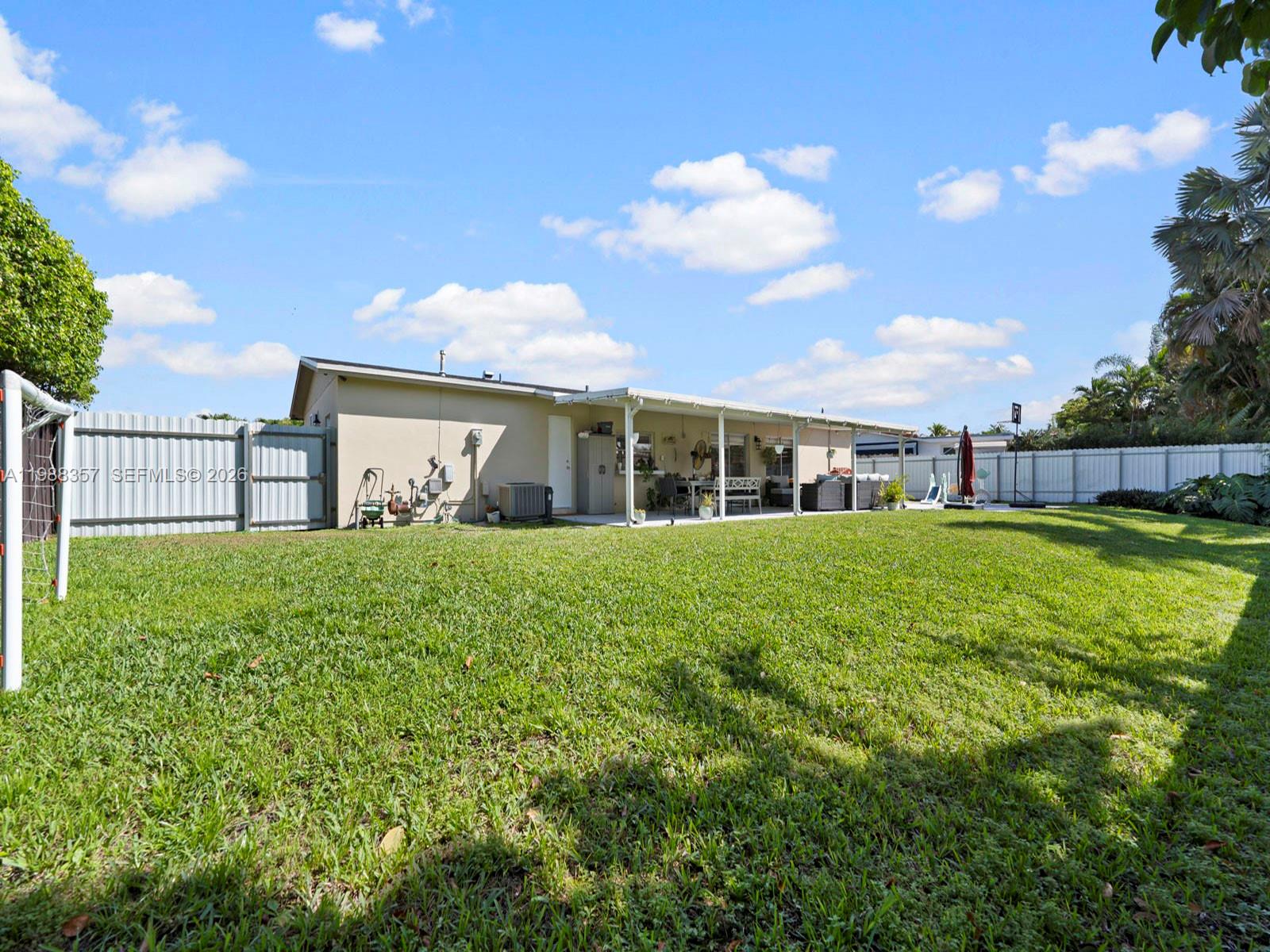 8530 Northwest 179th Street Hialeah, FL 33015 - Photo 24 of 28 a house view with a garden space
