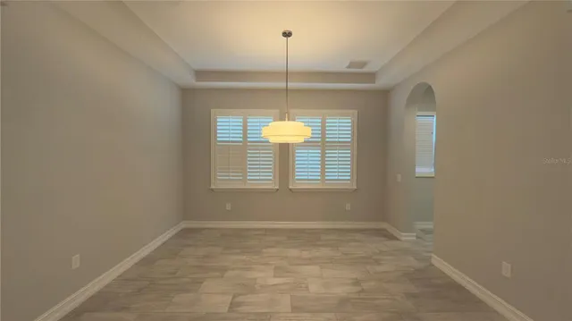 a bathroom with a toilet and shower