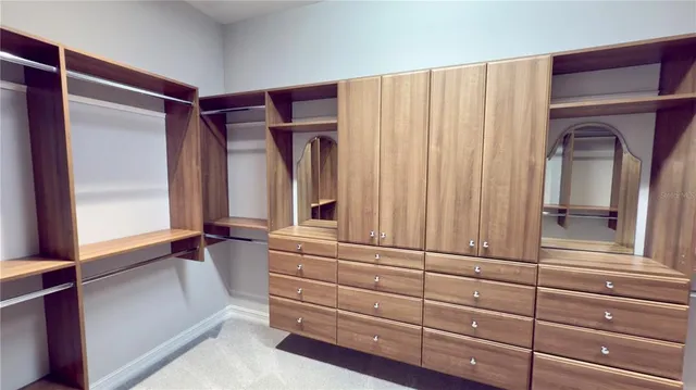 a bathroom with a sink toilet and mirror