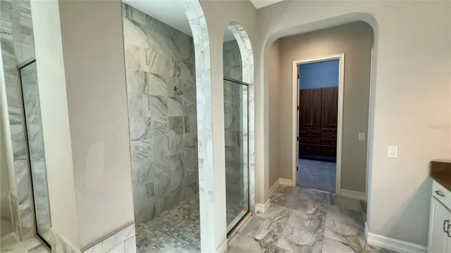 a view of a house with a yard and plants