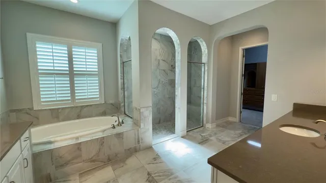 a view of a house with swimming pool and a yard