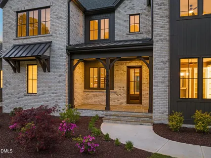 a front view of a house having outdoor space