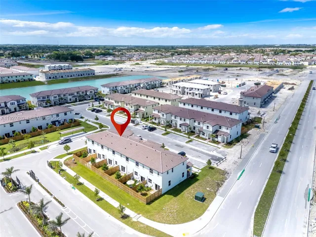 a view of a balcony with furniture and city view