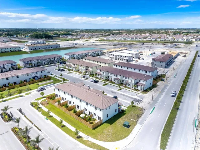 a view of a swimming pool with an ocean view