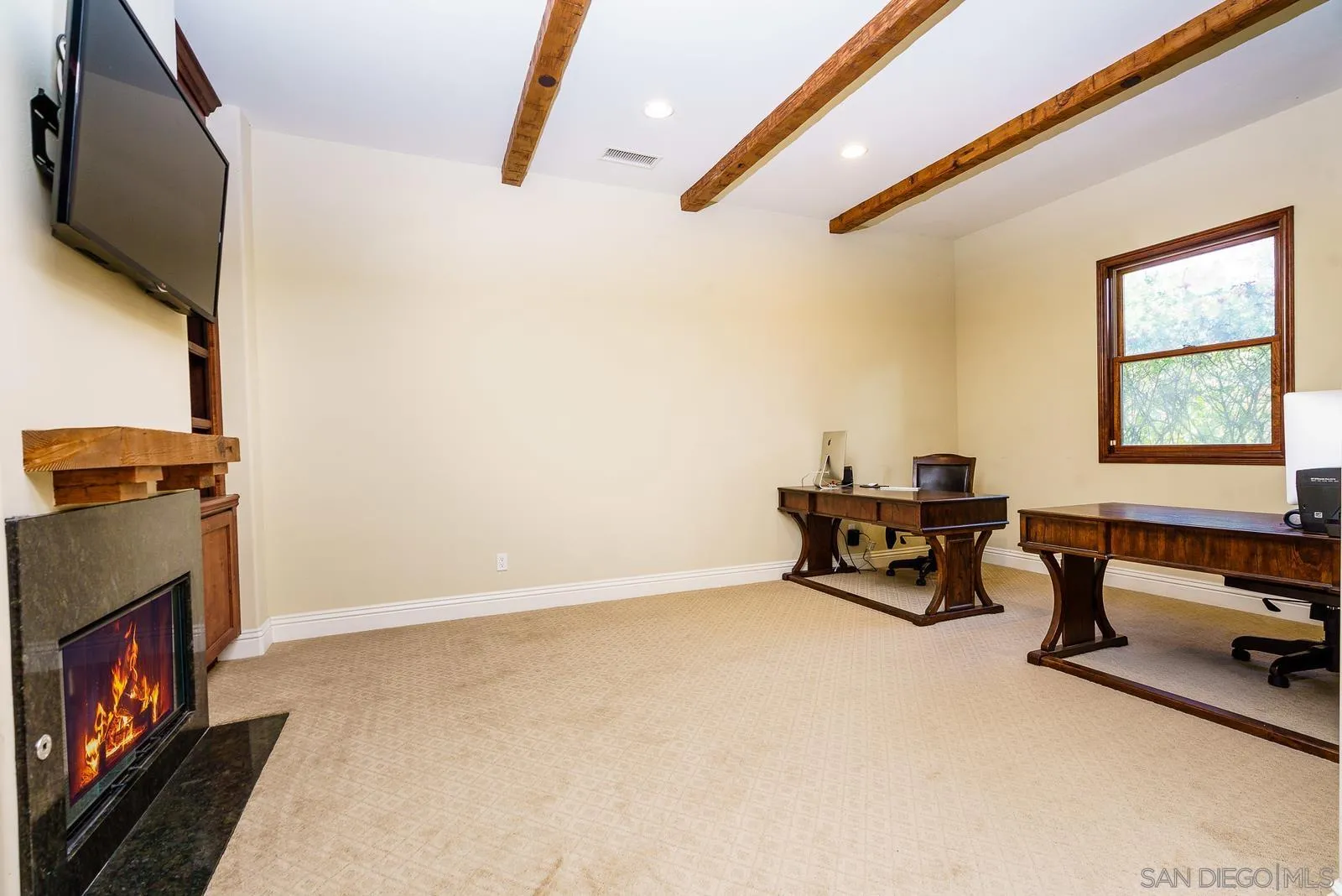 31781 Wrightwood Road Bonsall, CA 92003 - Photo 20 of 46 a living room with furniture and a flat screen tv