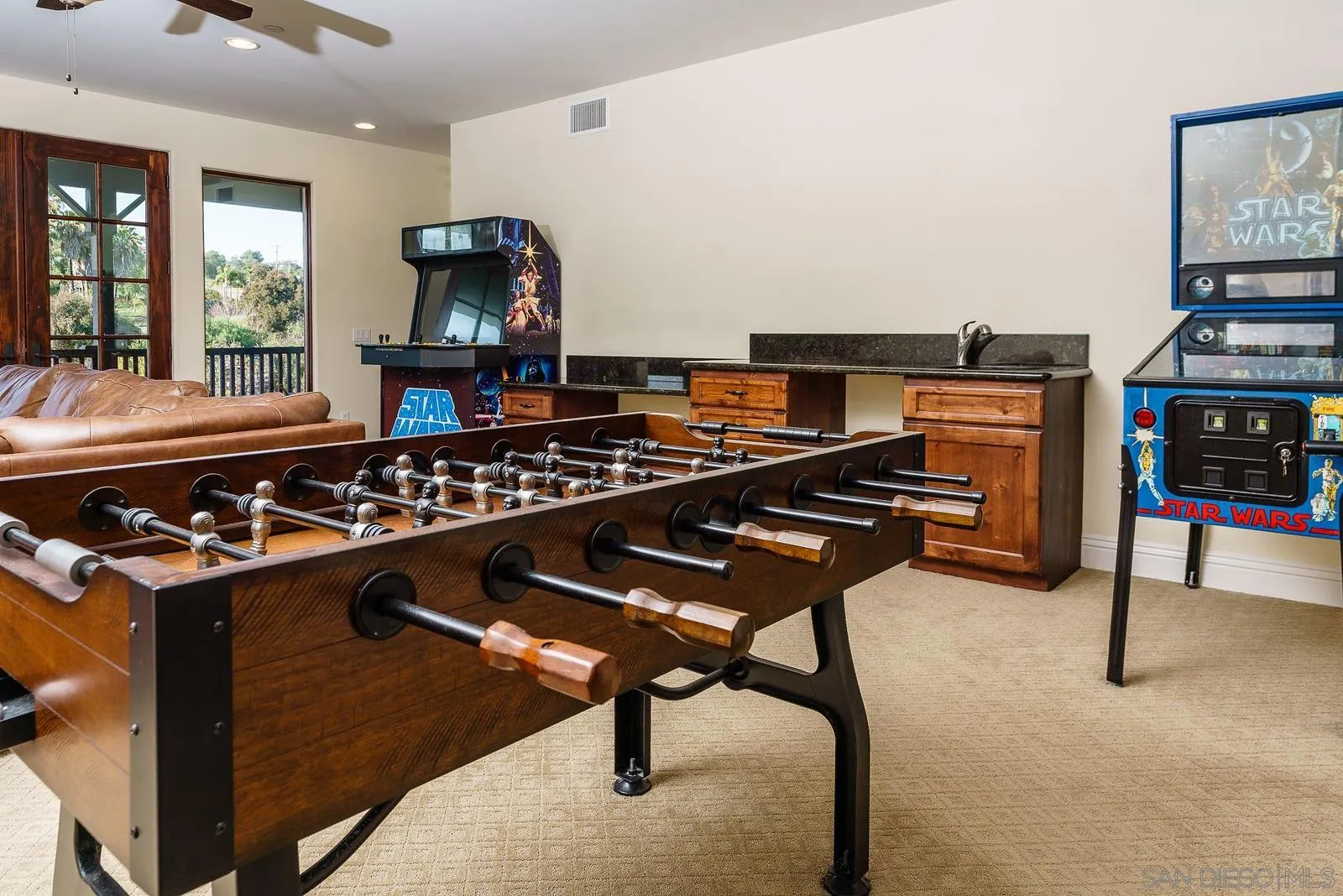 31781 Wrightwood Road Bonsall, CA 92003 - Photo 27 of 46 a kitchen with a stove and a wooden floor