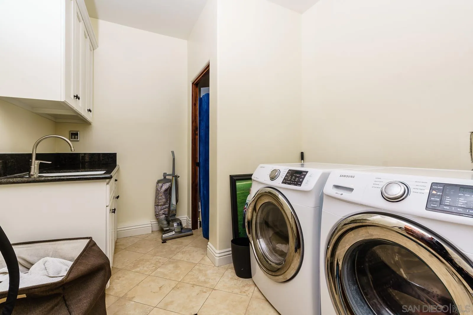 31781 Wrightwood Road Bonsall, CA 92003 - Photo 32 of 46 a utility room with dryer and washer