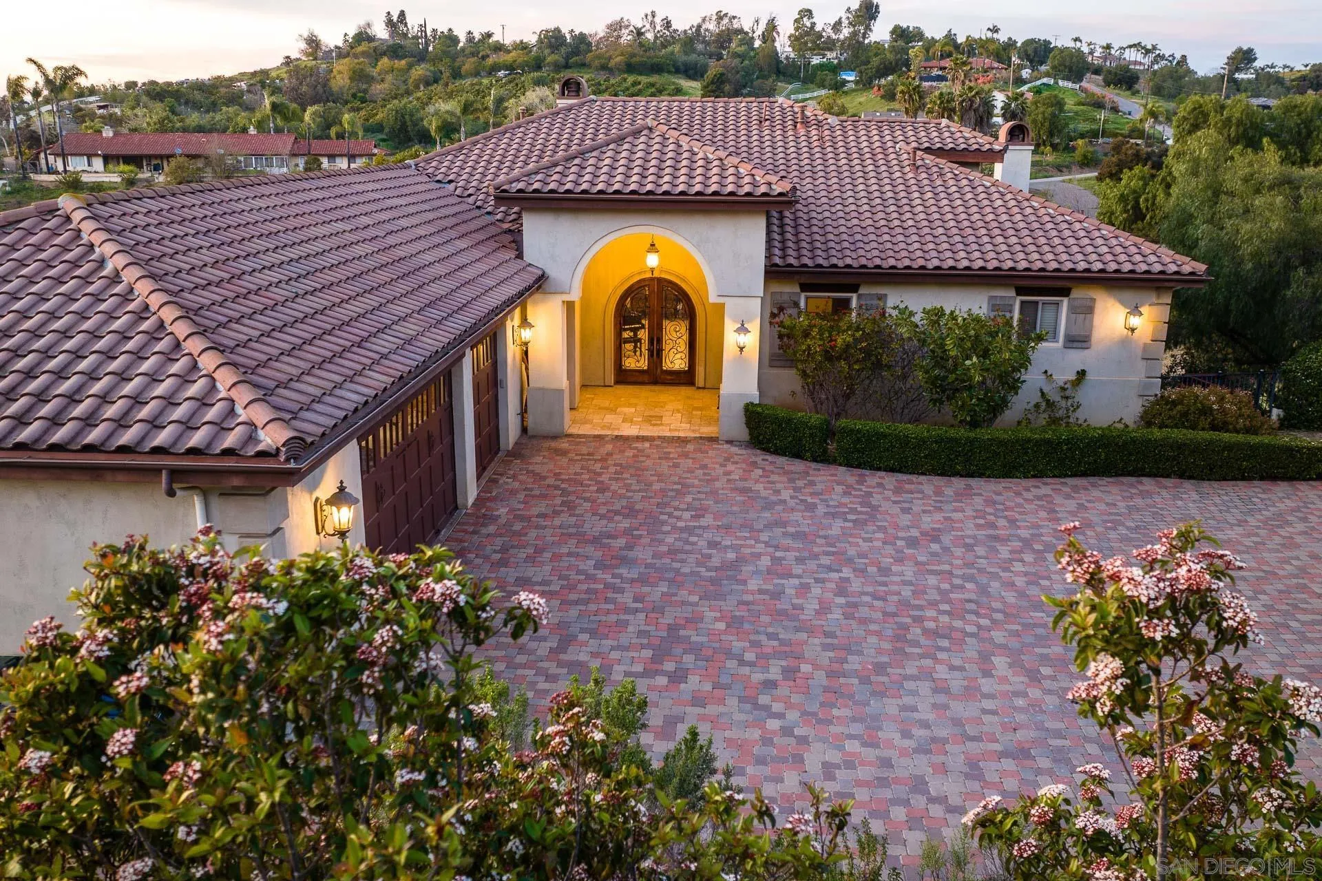 31781 Wrightwood Road Bonsall, CA 92003 - Photo 44 of 46 a view of a house with a yard and a garden