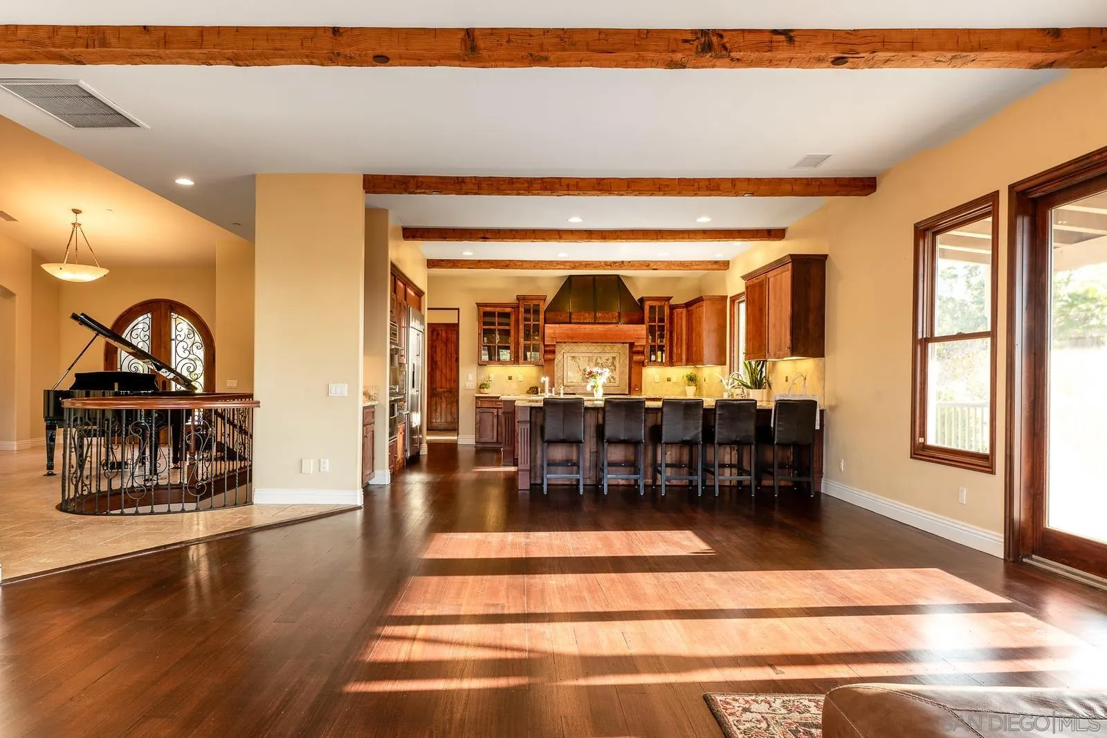 31781 Wrightwood Road Bonsall, CA 92003 - Photo 6 of 46 a view of a lobby with furniture and wooden floor