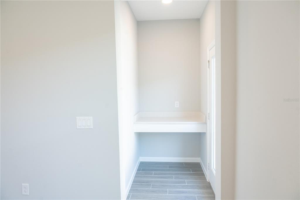 583 Pothos Street Apopka, FL 32703 - Photo 12 of 26 a view of a hallway