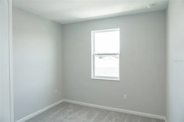 an empty room with a window