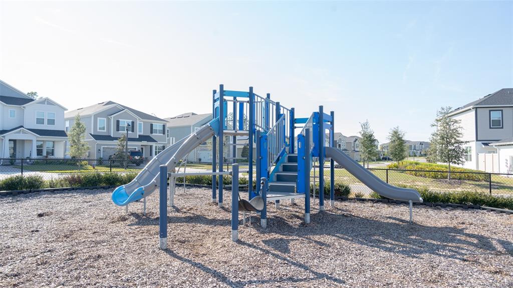583 Pothos Street Apopka, FL 32703 - Photo 22 of 26 a view of a house with a park