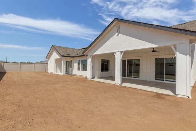 a view of a hallway with wooden floor and entryway