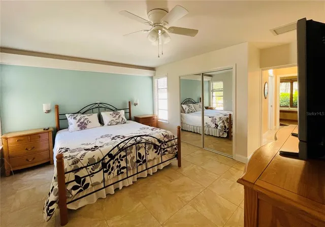 a bathroom with a sink mirror and toilet